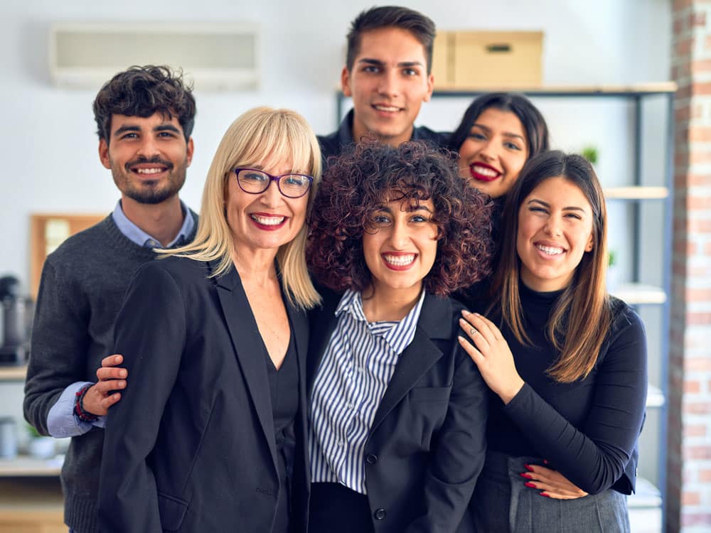 Alejandro Fuentes et al. posing for the camera